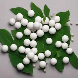 number of alumina ball with green leaves in background