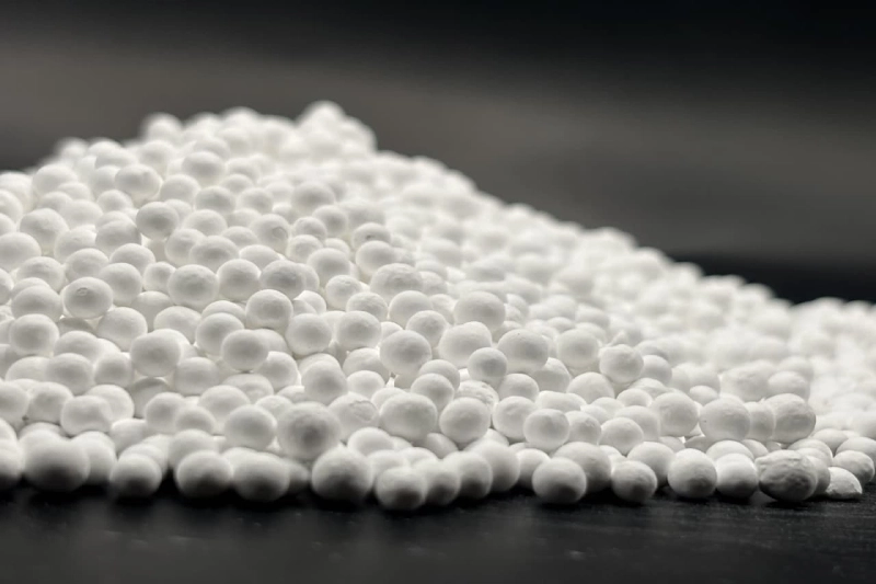 This picture shows activated alumina balls in a black background.