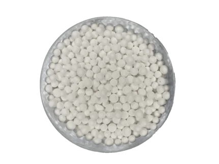 Activated alumina balls are in a small dish.